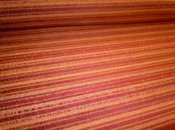 Pattern Bennington Color Burgundy woven upholstery fabric with railroaded stripes and chenille accents