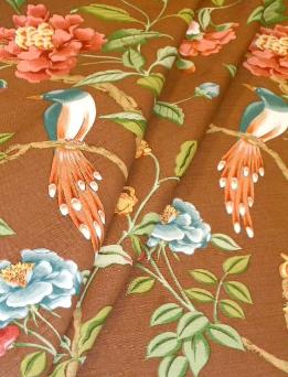 Draped curtain image of Hand printed Floral and Birds home decor fabric Blair in color Brown