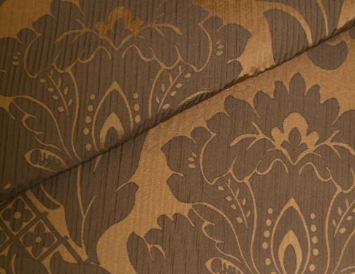 Closeup folded image contemporary damask pattern home decor and interior design fabric