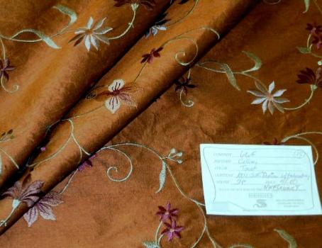 Schindler's Upholstery and Fabric Shop tag for Silk Dupioni Cellini color Toast with embroidery fabric