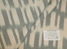Schindler's Upholstery and Fabric Shop tag for hand dyed Ikat pattern Laura and Kiran Simple Spacedye