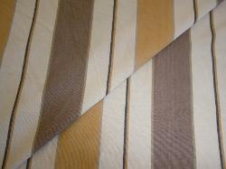 Closeup folded image of Laura & Kiran Corsica stripe in color Taupe, Gold and Natural