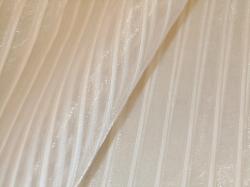 Closeup folded image of Fabricut Pattern Rubato Color Ice Drapery Curtain Sheer in white and transparent Polyester and cotton, doublewide for hanging vertically