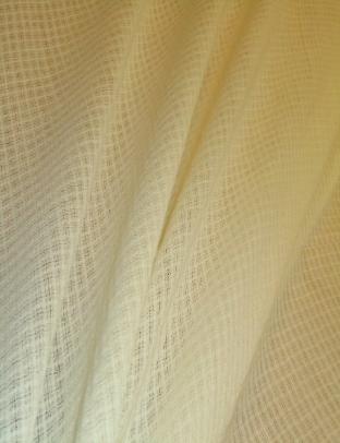 Draped curtain image of Beacon Hill worsted wool British made Fina casement in Cream