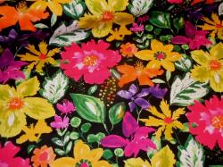 bright multi-color large repeat floral screen print on black ground, from Covington Fabrics