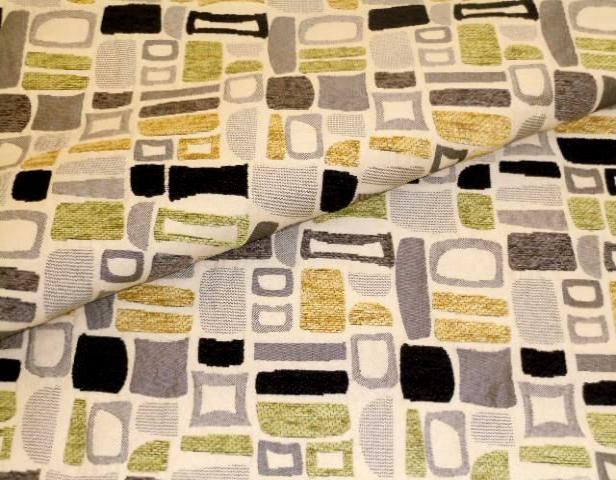 Closeup folded image of Contemporary Upholstery Fabric Pattern Geiger Color Oasis with geometric chenille accents, gray, yellow and green on cream
