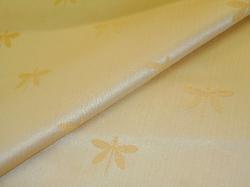 small dragonfly embroidery traditional design on light gold ground
