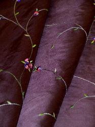 Draped curtain image of Silk Dupioni Kala color Aubergine with embroidery