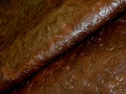 vinyl upholstery fabric heavily textured in a deep tobacco brown