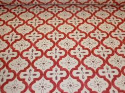 P Kaufmann Outdoor Conservatory Berry Decorator Fabric on cutting table