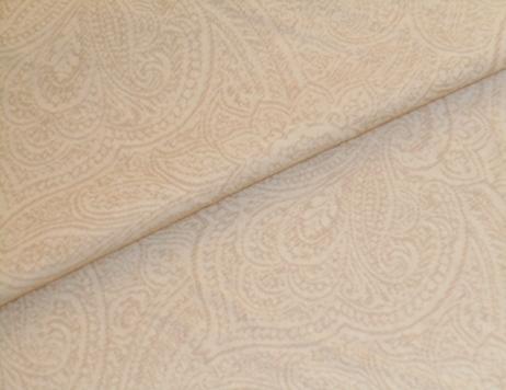 Closeup folded image of P Kaufmann Fabrics Closeout Paisley color Cream textured tone on tone design in washed cotton