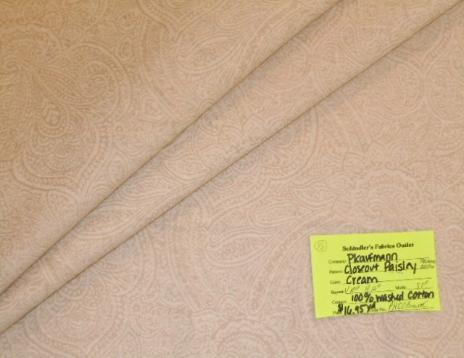 Schindler's Upholstery and Fabric Shop tag for Closeout Paisley color Cream,  textured tone on tone design,  in washed cotton,  from P Kaufmann Fabrics clearance