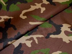 closeup of outdoor and marine canvas in camouflage, colors black, tan, green and dark brown