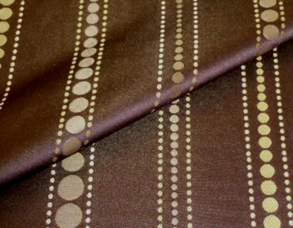 Closeup folded image of discounted to design cheap stripe in polka dot design Decorator Fabric