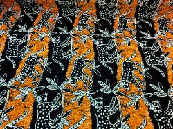 African design upholstery and interior decorating fabric with railroaded rows of jungle cats