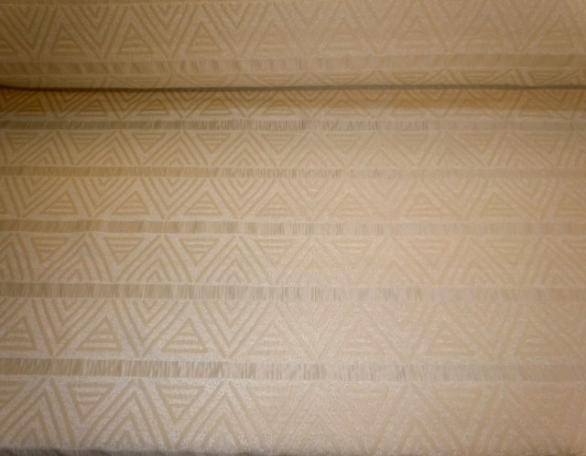 Pattern Spectrum in Color Tawny Decorator Fabric on cutting table