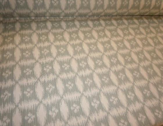 Angled image of medium weight woven jacquard cotton home decorating fabric, Pattern Sumba Color Chambray