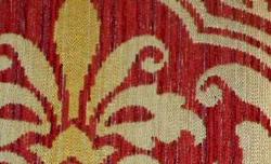 Swatch of railroaded floral medallion damask design Tantalor in Color Paprika