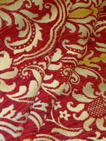 Draped curtain image of railroaded floral medallion damask design Tantalor in Color Paprika