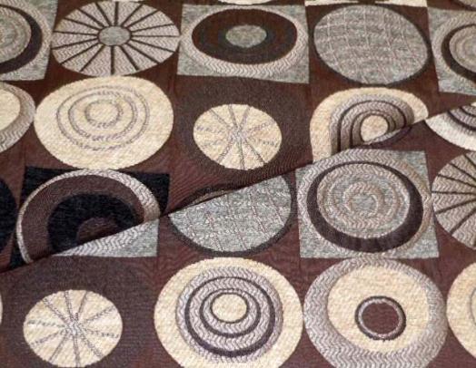 Closeup folded image of contemporary geometric circle upholstery fabric Techniques in Coco