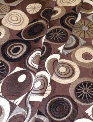 Draped curtain image of woven chenille accented contemporary geometric circle pattern, for furniture upholstering, cushions and decorating accents