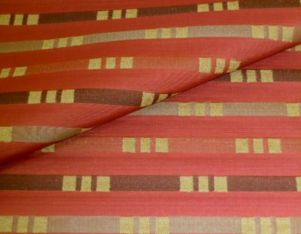 Closeup folded image of Pattern Traffic in color Mango, Upholstery Fabric a Polyester Nanotex Commercial Contract Hospitality  Chenille accented Geometric pattern