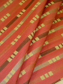 Draped curtain image of Geometric woven textured pattern with chenille accents from Nanotex with soil and stain resistant manufacturer's finish, discounted to design cheap