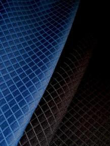 Draped curatin image of classic textured small square diamond pattern upholstery fabric