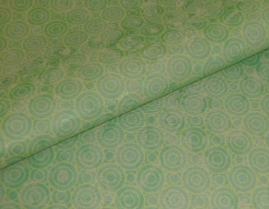 Closeup folded image of discounted circle pattern contemporary upholstery fabric for designing on the cheap