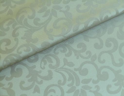 Closeup folded image of floral scroll pattern Ilard Decorator Fabric Color Platinum