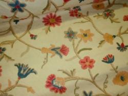 premium upscale crewel embroidery in a Jacobean floral design home decorating fabric
