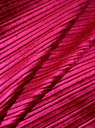 soft plush railroaded stripe cut velvet in reddish-purple with a sheen